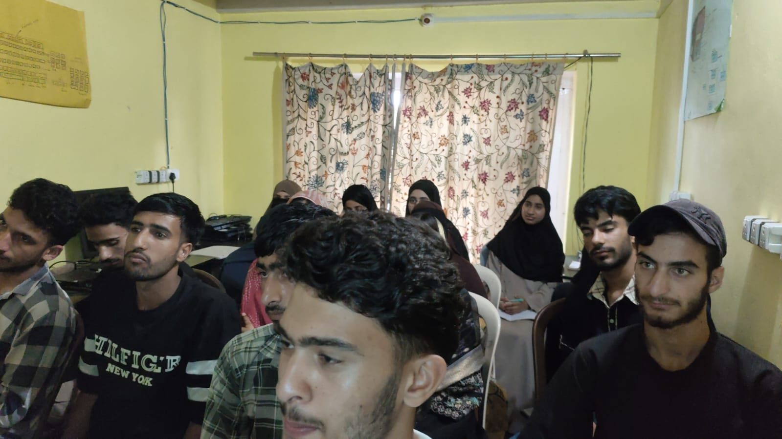 Students seated together during a computer training session at the resource centre